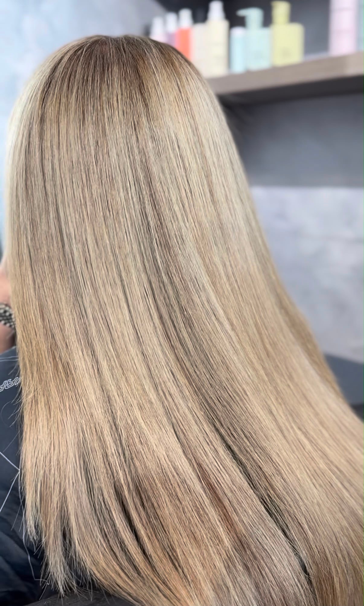 Long straight blonde hair extensions result — seamless length and volume